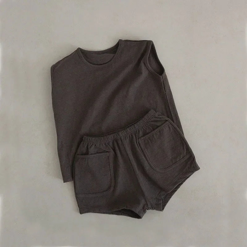 Ensemble débardeur et short en coton pour bébé fille et garçon, vêtement casual de la marque Petit Trésor.